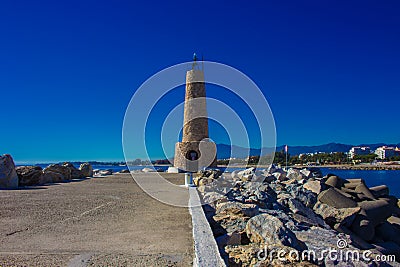 Lighthouse. Port of Puerto Banus. Editorial Stock Photo